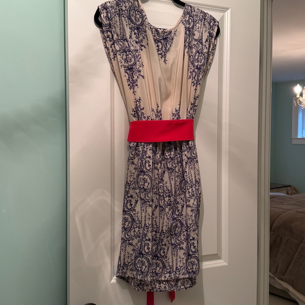 Elegant Blue and Cream Dress with Red Belt